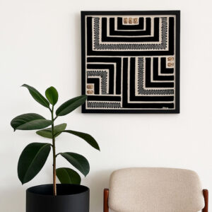 tableau Arabica3 exposé sur un mur blanc